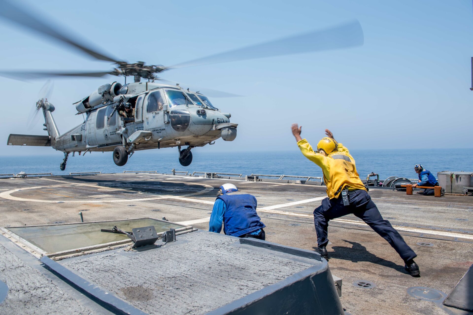 170805-N-VR594-0287
ARABIAN GULF (Aug. 5, 2017) Rear Adm. Bill Byrne, commander of Carrier Strike Group 11, departs the Ticonderoga-class guided-missile cruiser USS Princeton (CG 59) on an MH-60S Sea Hawk helicopter assigned to the "Eightballers" of Helicopter Combatant Strike Squadron (HSC) 8. Princeton is deployed to the U.S. 5th Fleet area of operations in support of maritime security operations designed to reassure allies and partners, and preserve the freedom of navigation and the free flow of commerce in the region. (U.S. Navy photo by Mass Communication Specialist 3rd Class Kelsey J. Hockenberger/Released)